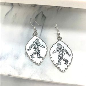 Big foot white and  silver color earrings